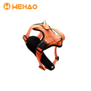 Vibrant orange padded no-pull dog harness with breathable air mesh lining and adjustable straps, featuring Wehao logo for B2B wholesale supply.