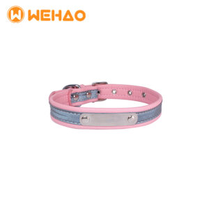 Pink padded reflective dog collar featuring a stainless steel ID nameplate and adjustable metal buckle, branded with Wehao logo for B2B wholesale and OEM customization.