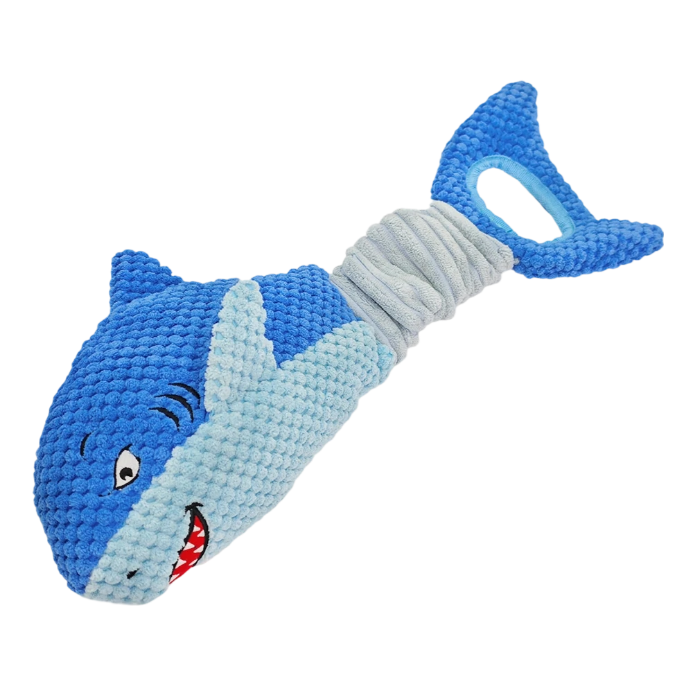 Wholesale blue shark dog toy made of textured pineapple fleece. Features a stretchable elastic bungee tail for tug-of-war, squeaker, and crinkle paper. Manufactured for B2B pet supplies.